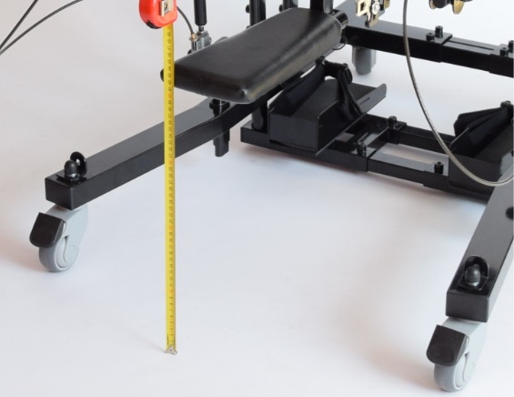 A lowered ErgoStande static standing frame seat 